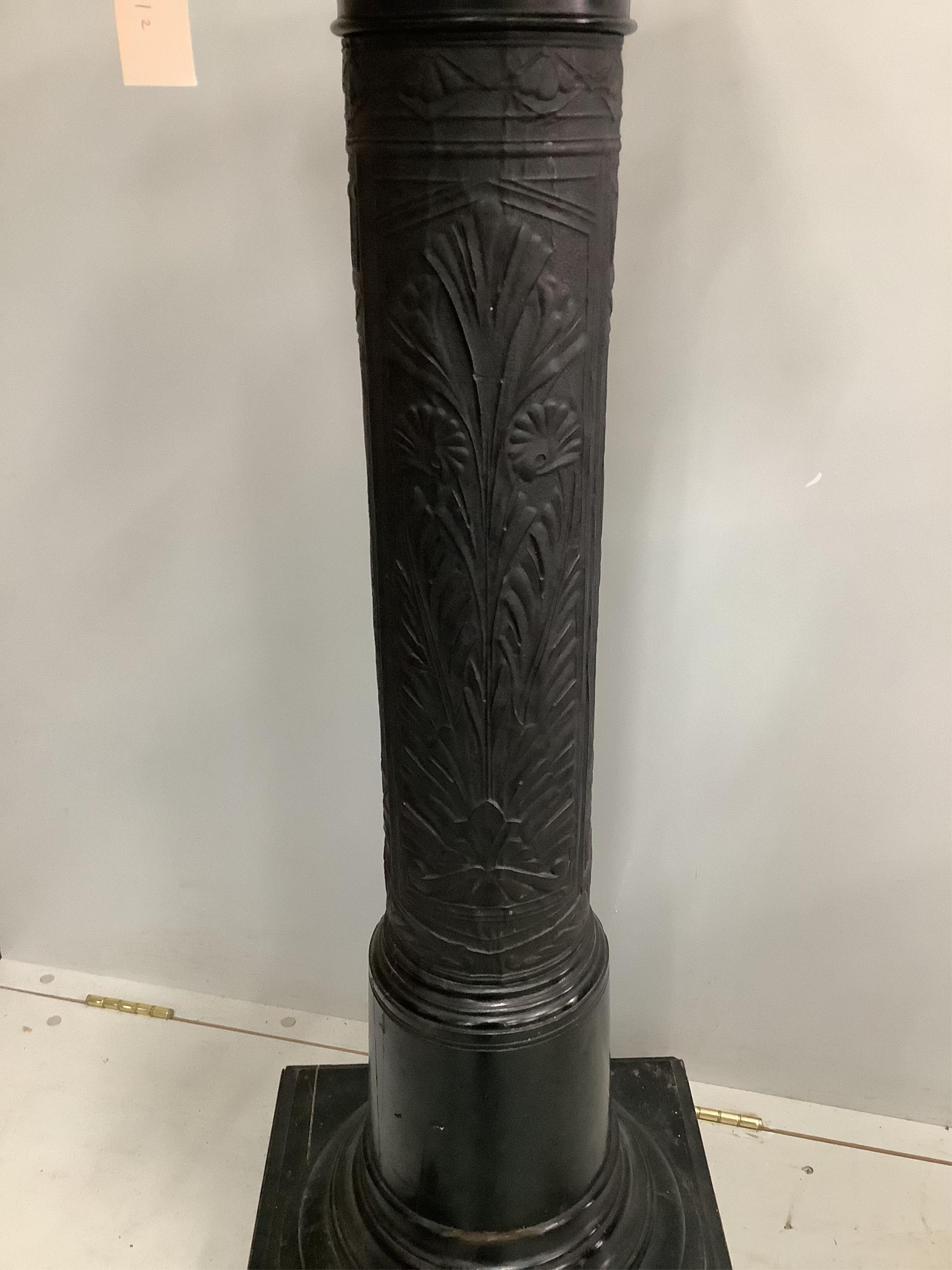 A late Victorian carved and ebonised pedestal, width 36cm, height 115cm. Condition - fair